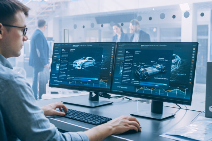 Automotive Engineer working on computer